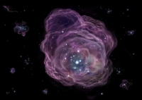 初代の巨大質量星の爆発の想像図。大質量星の集団のなかで最も質量の大きいものが爆発を起こし、周囲に物質を放出すると考えられる(写真：国立天文台)
