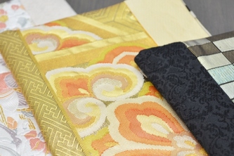 京都の「西陣織」を使用し仕上げたデジタルアクセサリーケース『【musubi】西陣織 kurumi for iPadAir・iPadmini』