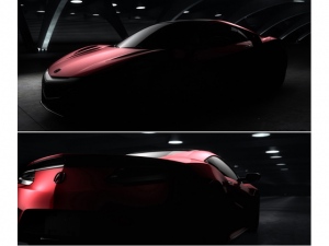 新型NSXの量産モデルの予告イメージ。新世代のホンダ・ミッドシップ・スーパースポーツのフォルムである 新型NSXの量産モデルの予告イメージ。新世代のホンダ・ミッドシップ・スーパースポーツのフォルムである
