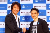 ニワンゴの杉本誠司社長(左)とウェザーニューズ取締役の石橋知博氏(ウェザーニューズの発表資料より) ニワンゴの杉本誠司社長(左)とウェザーニューズ取締役の石橋知博氏(ウェザーニューズの発表資料より)