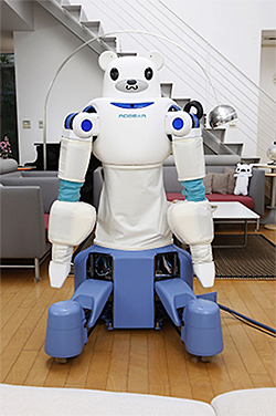移乗介助や起立補助など、人との柔らかな接触と大きな力が必要とされる動きをロボットで同時に実現するための研究用プラットフォーム「ROBEAR(ロベア)」（理化学研究所の発表資料より）