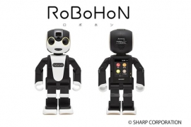 DMM.comは、シャープのモバイル型ロボット電話「RoBoHoN(ロボホン)」を販売する。(写真:同社発表資料より) DMM.comは、シャープのモバイル型ロボット電話「RoBoHoN(ロボホン)」を販売する。(写真:同社発表資料より)