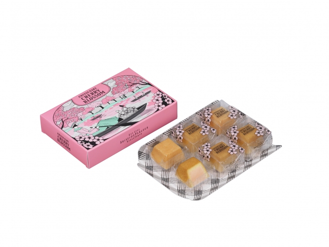 春らしいイラストが描かれた「春のチーズケーキ（さくら味）」（資生堂パーラー報道資料より）