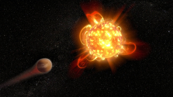 赤色矮星が放つフレアが公転する惑星の大気に影響を及ぼす想像図 (c) NASA, ESA and D. Player (STScI)
