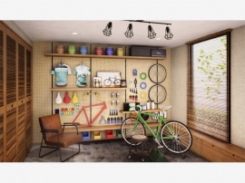 ロードバイクが趣味の若者の部屋を改装し、自転車のパーツの保管やメンテナンスの工具を見せながら収納するインテリアをつくるという東急ハンズの提案のひとつ