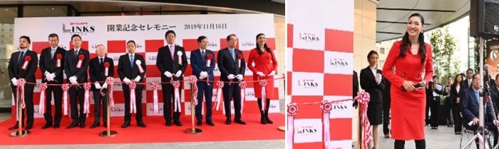 記念セレモニーでのテープカット、右はスペシャルゲストのアンミカ
（画像: ヨドバシホールディングスの発表資料から）