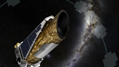 This artist concept shows NASA's planet-hunting Kepler spacecraft operating in a new mission profile called K2. In 2013 the spacecraft lost its ability to precisely stare at its original target area, but a clever fix created a second life for the telescope that proved scientifically fruitful, showing K2 could still find exoplanets. (Nasa.gov)