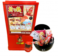 障がい者の収入10倍UPを目的とした『おりづるガチャ』マシーン高騰・在庫不足を業界大手企業と提携で解消！