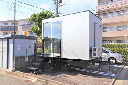 賃貸マンションの駐車場空き区画を活用 「衣類乾燥機付きトレーラーハウス」の需要測定の実証実験を開始　（ニュースリリース）