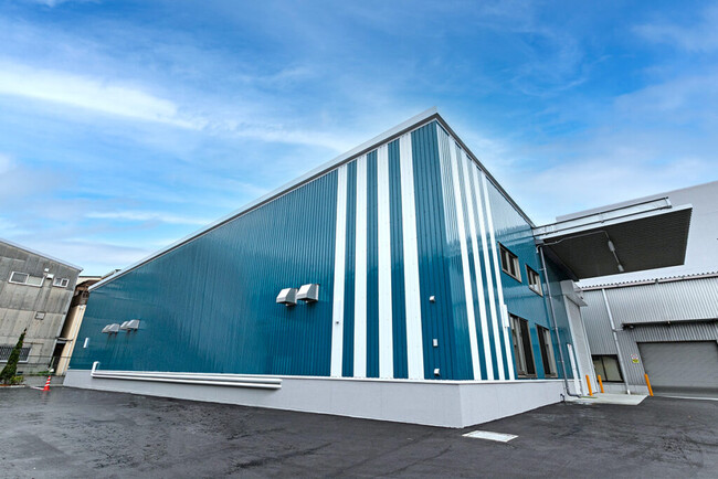 新工場の竣工と新たに導入した枚葉機の始動式を実施