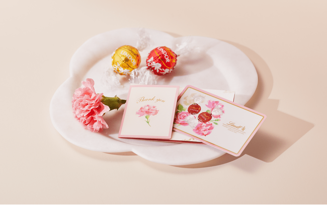 お花ブランド「ブルーミー」、「Lindt（リンツ）」とのオリジナルギフトカードを、母の日に向け、全国のリンツ ショコラ ブティック、ブティック＆カフェ、オンラインショップで販売開始