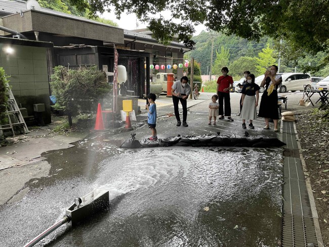 昭和レトロな温泉銭湯 玉川温泉にて、梅雨・台風シーズンに備える「土嚢づくり」などの防災ワークショップを実施