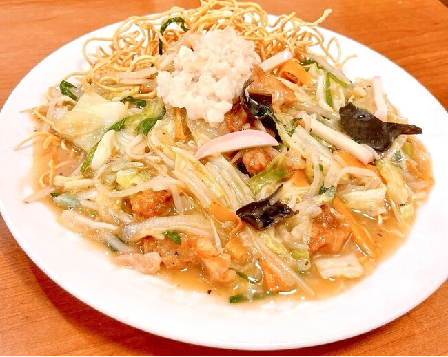 『肉野菜炒め ベジ郎』　進化メニュー登場！！一日分の野菜が取れる　〘皿うどん〙　！！