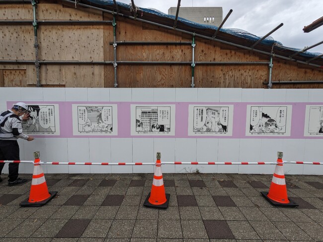 歩道橋の工事現場に『ご当地漫画』！市の魅力を紹介するご当地漫画「だも豊」を活用し、歩道橋周辺に実在するスポットの効果的なPRを実施