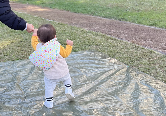 たくさんのお子様が笑顔をみせた牧場まつりイベント 「フォローアップミルク つよいこ約1kgを背負って体験」