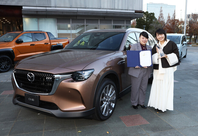 モビリティのカラーデザインコンテスト「オートカラーアウォード2024」グランプリは、マツダ株式会社「MAZDA CX-80」のメルティングカッパーメタリックに決定！