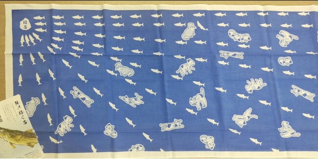 山形県遊佐町の海ノ民話アニメーション「鮭の招く石」とコラボ「オリジナル手ぬぐい」を販売