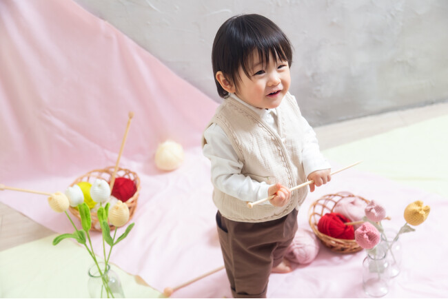 ふわり、ぬくもりを咲かせて。毛糸でできたお花の『お花屋さん』ごっこができるベビーフォト【写真工房ぱれっと】
