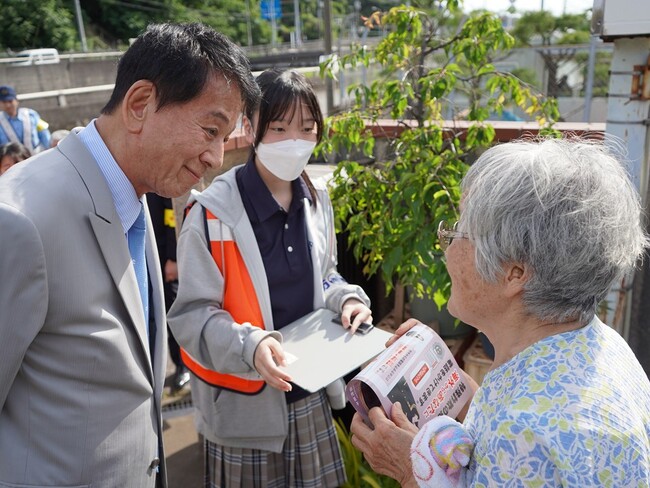 杉対策監 千葉市中央区都町で戸別訪問を実施 地域住民へ国際電話の利用休止を要請