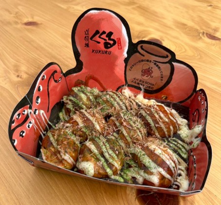 卵の殻のリサイクルに万博から貢献！エス・ピーパック、大阪・道頓堀銘店のたこ料理専門店「たこ家道頓堀くくる」に、環境配慮型紙を使用した紙器の提供を開始