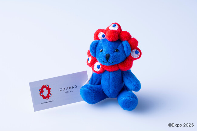 大阪・関西万博公式キャラクター「ミャクミャク」とコラボレーション「EXPO2025【コンラッド大阪】ミャクミャク なりきりぬいぐるみベア」が新登場