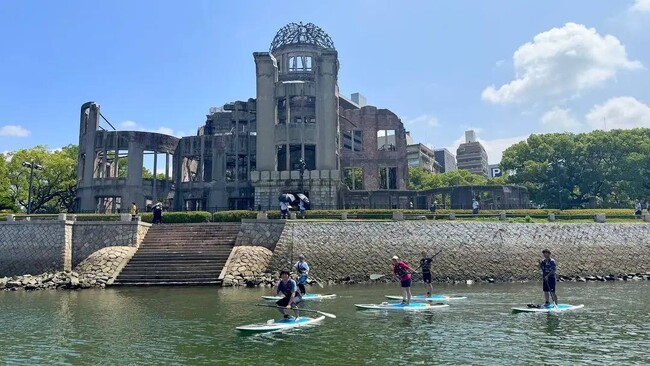 【叡啓大学】SUP部、外国人向け原爆ドームツアーが好評　９月６日（土）ひろしまスタジアムパークに新拠点開設
