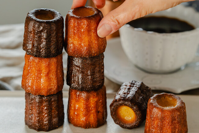 蔵前の焼きたてカヌレ専門店「KURAMAE CANNELE」、蔵前本店限定で焼き加減を変えた「クラマエ・カヌレ やさし焼き」販売