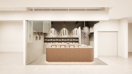 kuyuステラプレイス店の店舗内観。お香の原料となる植物を育む「土」をイメージした什器と白を基調とした落ち着いた空間設計
