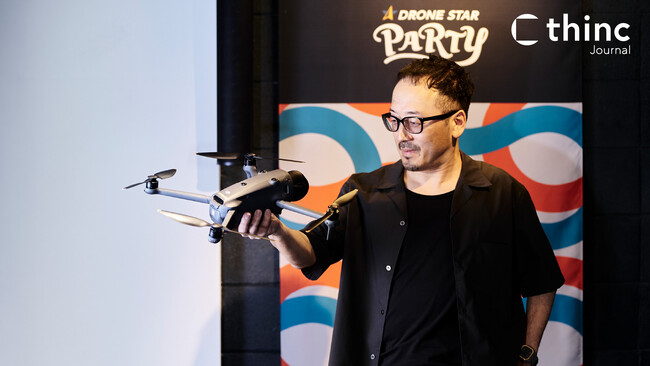 地域のクリエイティブ現場を届ける「thinc Journal」で新連載｜ドローンで観光と教育を変える。Dron e motion・田口厚氏が語る、趣味がキャリアになるまでの10年