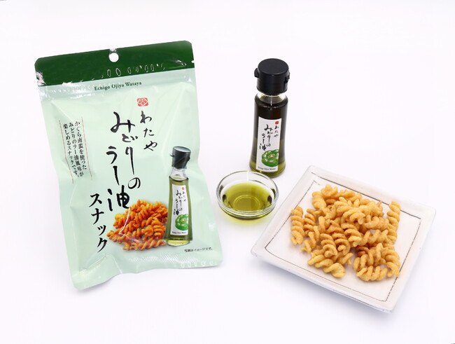 小千谷へぎそば わたや × 阿部幸製菓の共同開発「わたや みどりのラー油スナック」を７月18日に新発売